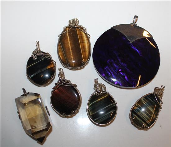6 quartz pendants incl tigers eye and another pendant